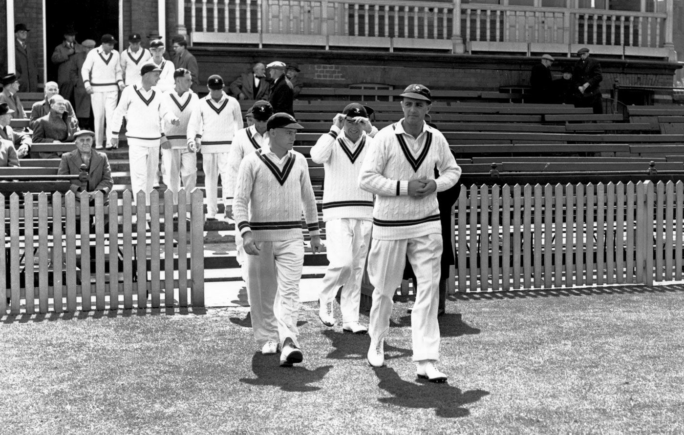 Jack Cheetham leads his team out