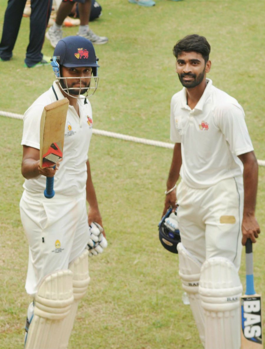 Balwinder Singh Sandhu and Vishal Dabholkar after their team's close win