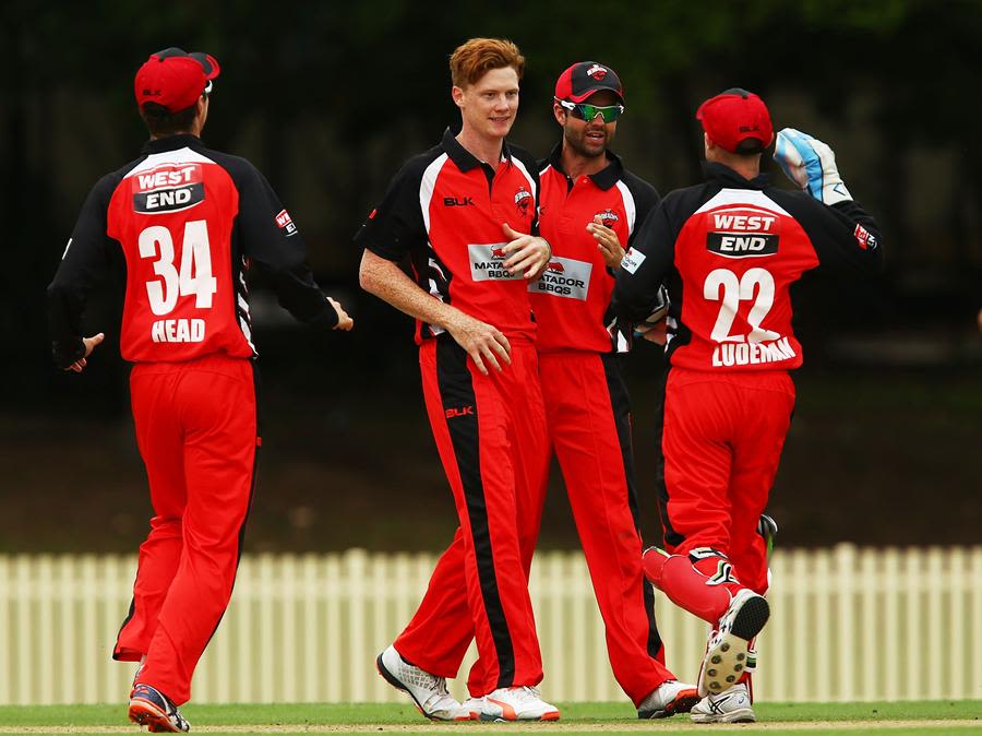 Tom Andrews celebrates a wicket