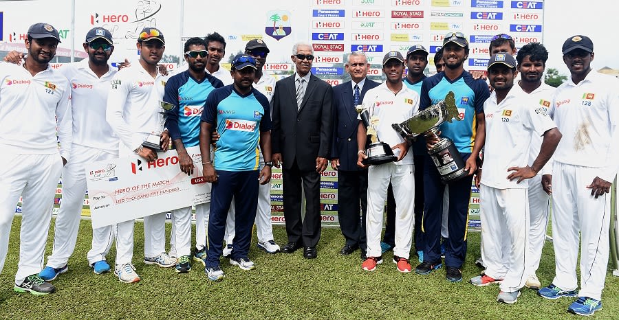 The victorious Sri Lankan players with Garry Sobers and Michael Tissera