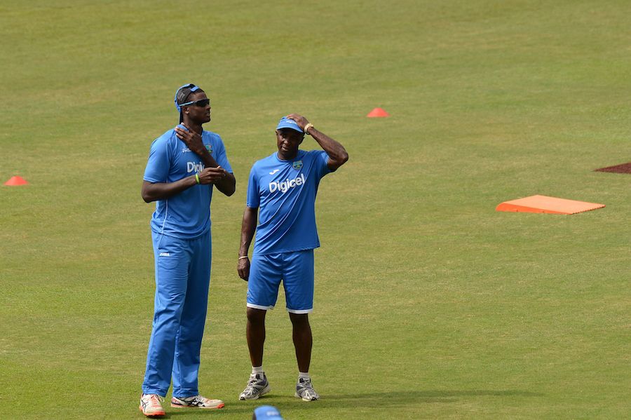 West Indies coach Eldine Baptiste and captain Jason Holder have a chat