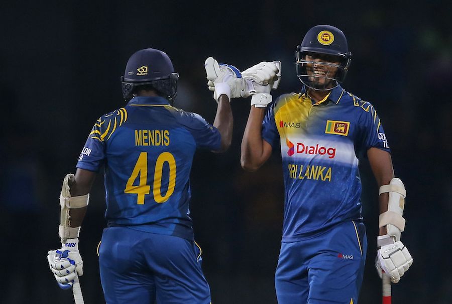 Ajantha Mendis and Suranga Lakmal celebrate Sri Lanka's narrow victory over West Indies