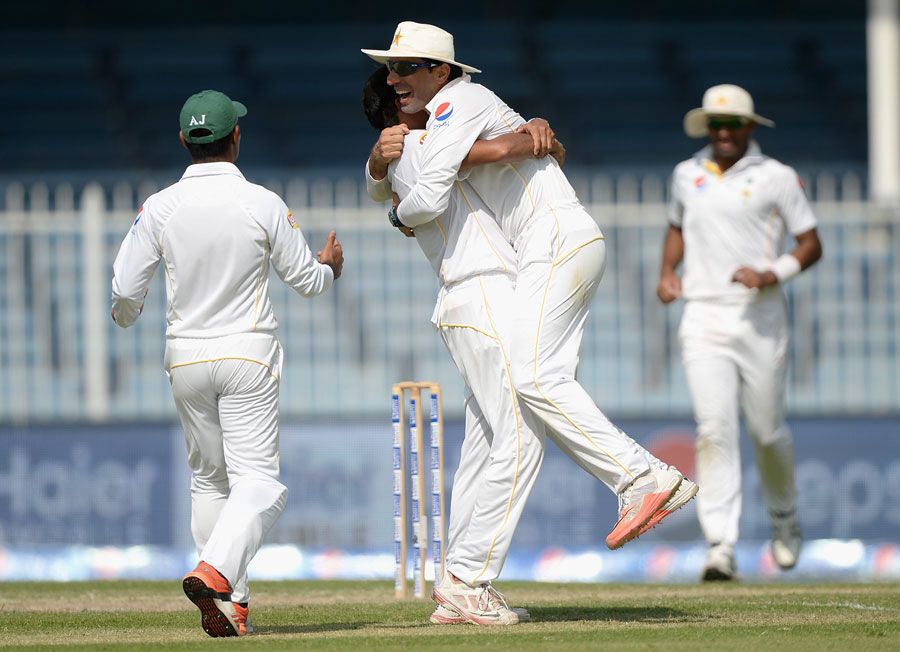 Misbah-ul-Haq leaps into Zulfiqar Babar's arms