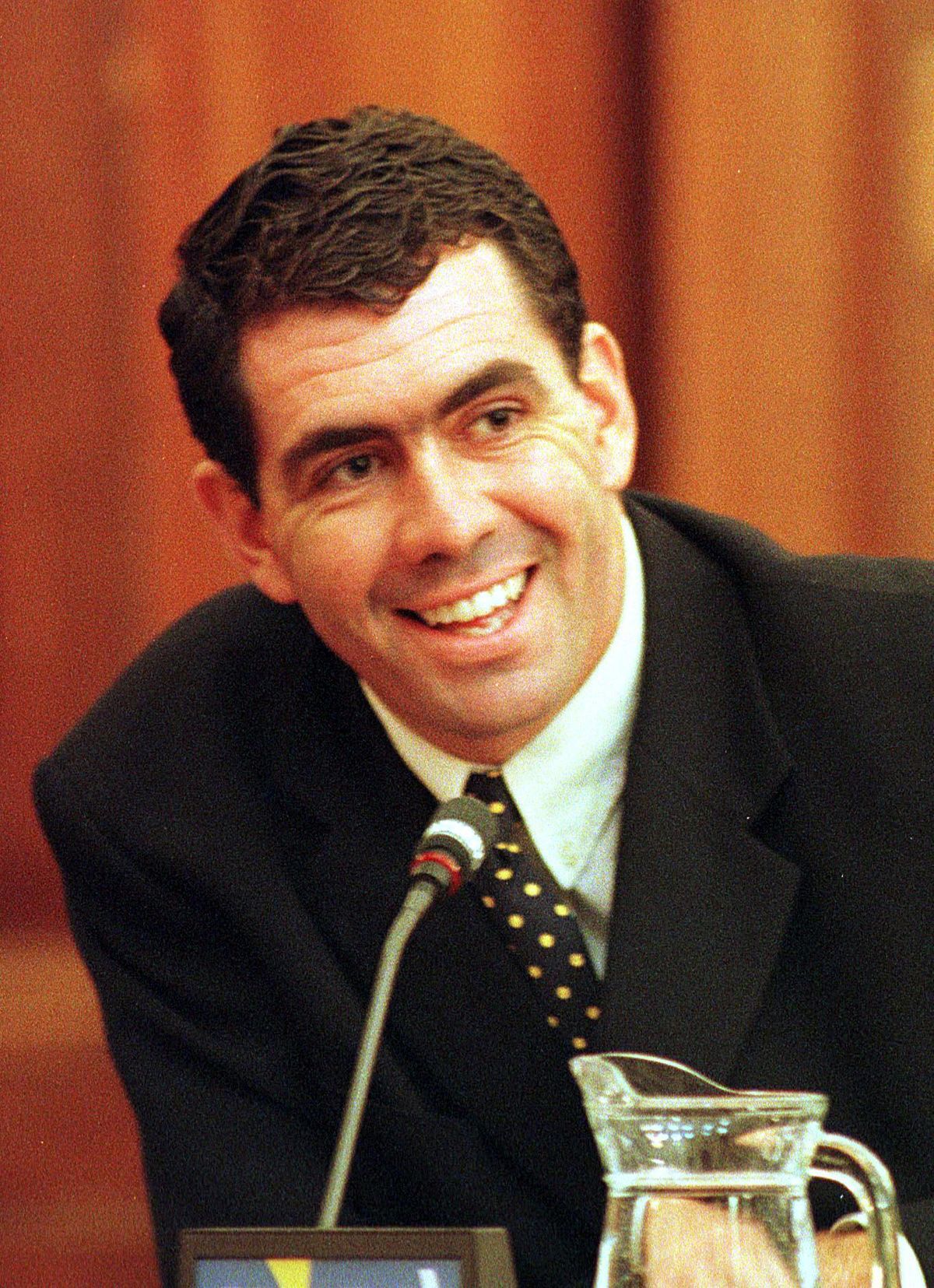 Hansie Cronje manages a smile during his cross-examination