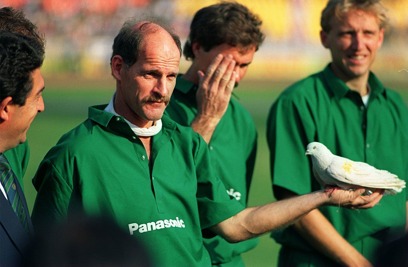 Clive Rice holds a dove