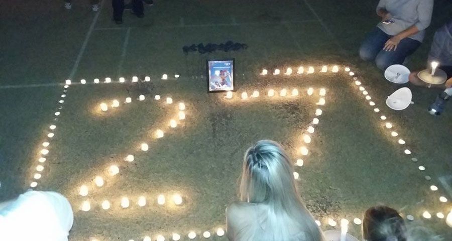 A tribute to Raymond van Schoor featuring a framed picture and his shirt number