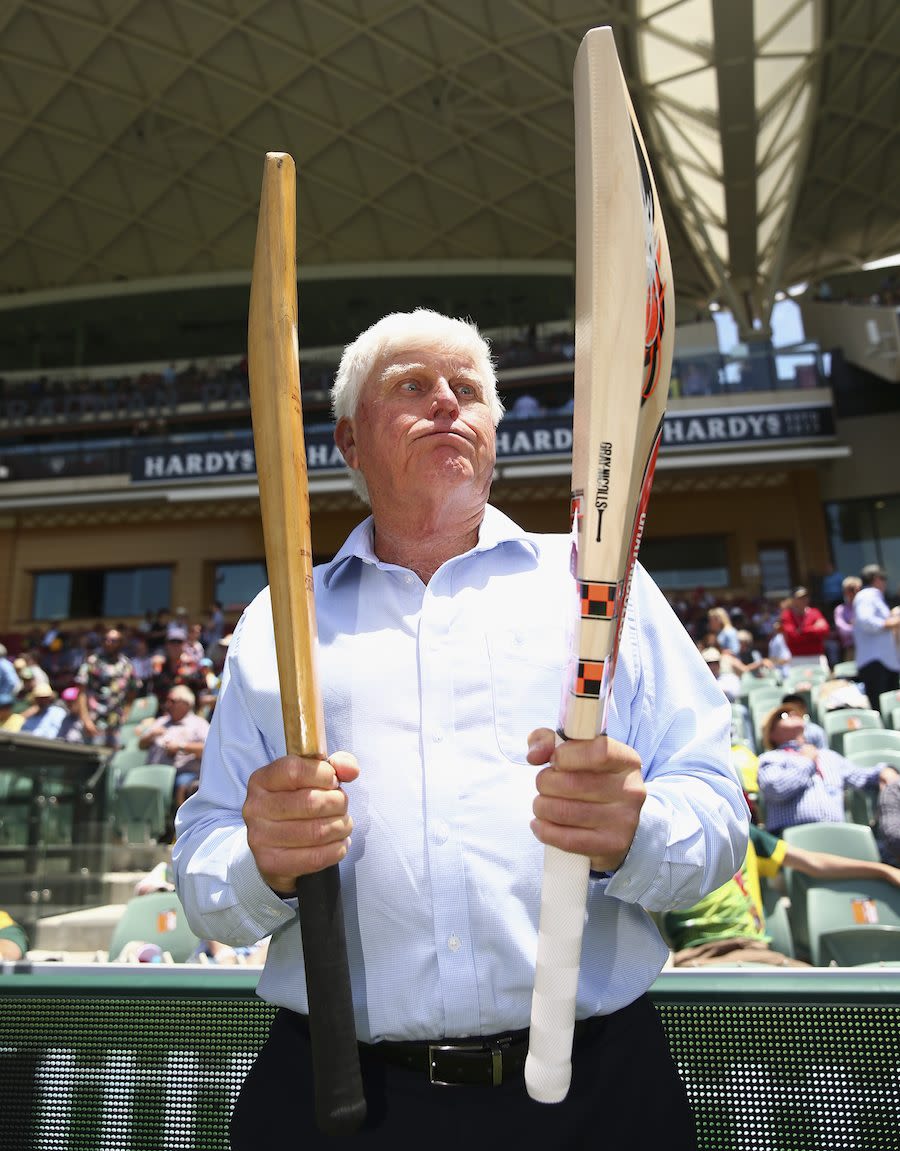 Barry Richards holds the bat with which he made 325 in a day at the WACA in 1970 in his right hand, and David Warner's modern-day weapon in his left