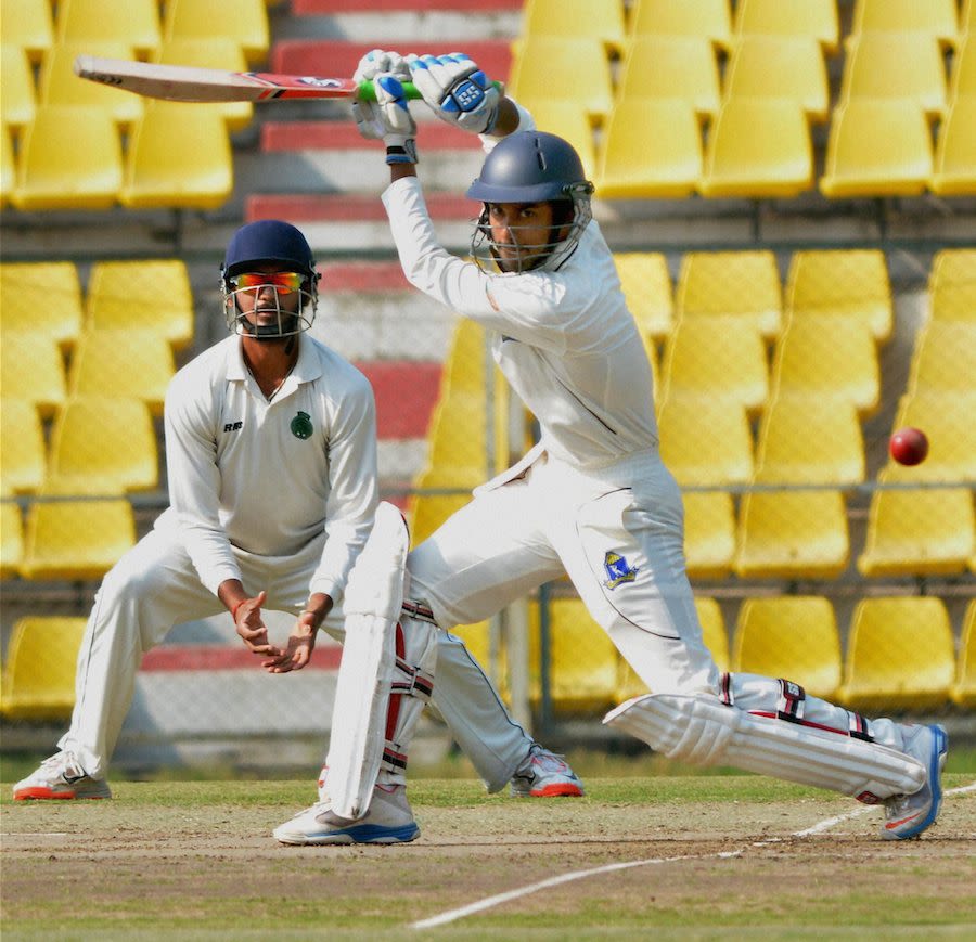 Sayan Mondal drives during his knock of 87