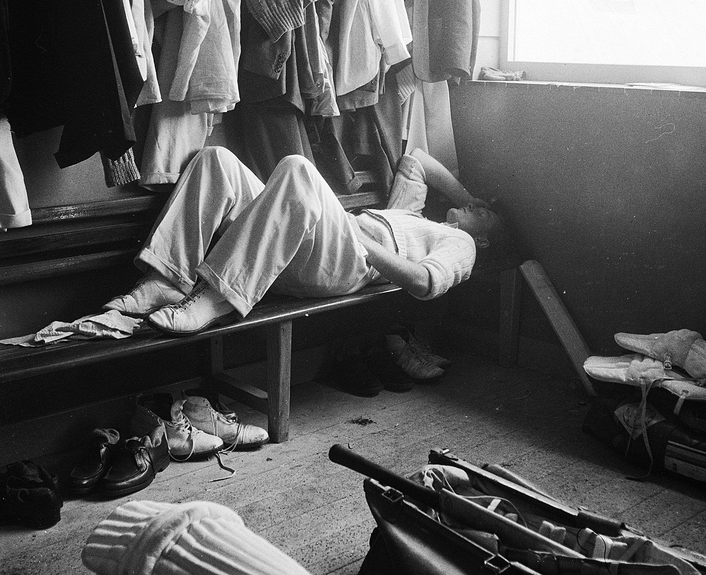 Peter Richardson takes a nap in the dressing room