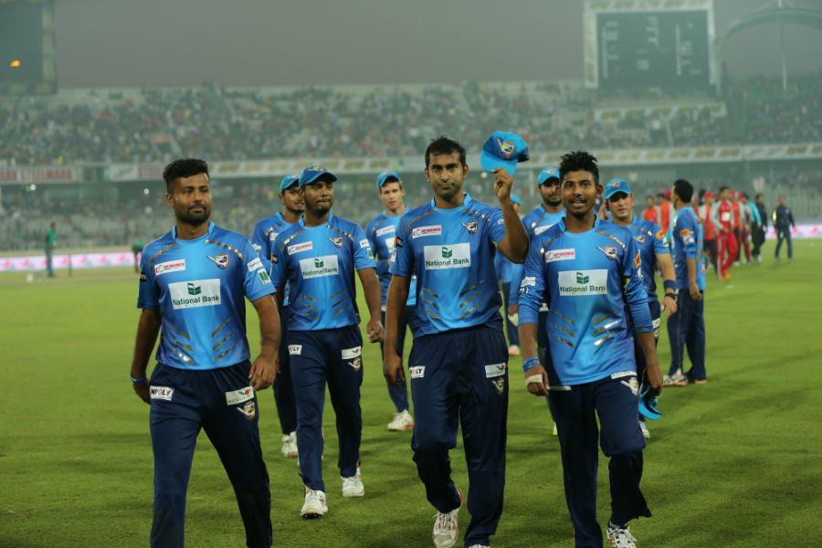 Mosharraf Hossain leads his team off the field