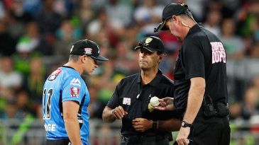 Umpire Abood officiates at BBL in helmet