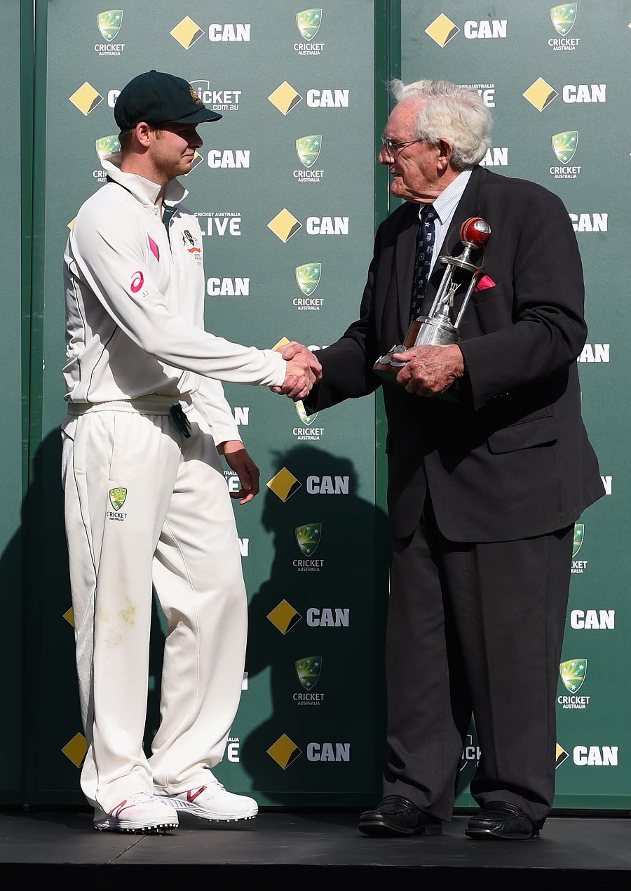 Steven Smith is congratulated by Alan Davidson before receiving the Frank Worrell Trophy