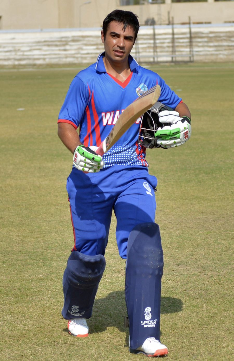 Salman Butt walks back after his hundred