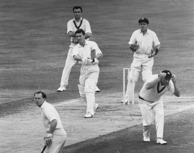 Fred Titmus hits a six