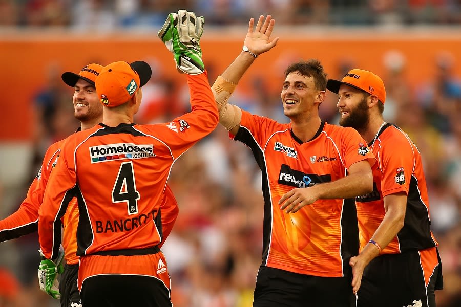 Matt Dixon celebrates one of his three wickets