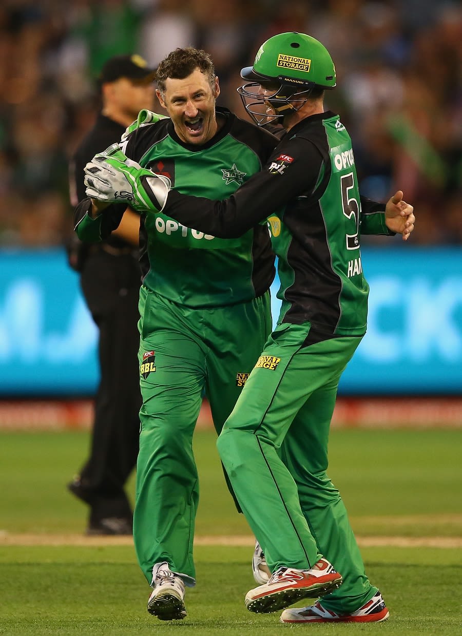 David Hussey celebrates