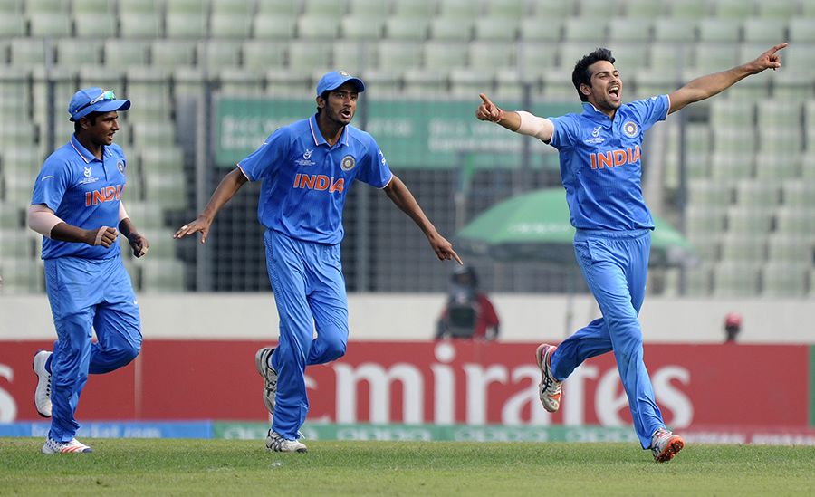 Mayank Dagar takes off on a celebratory run after a wicket