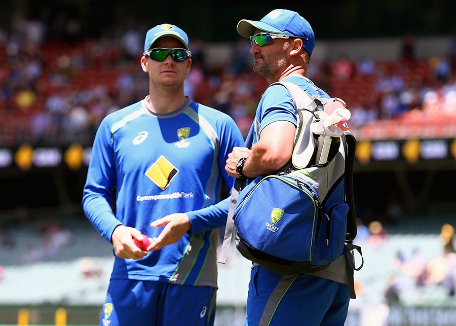 Steven Smith and Michael Di Venuto have a chat before start of play
