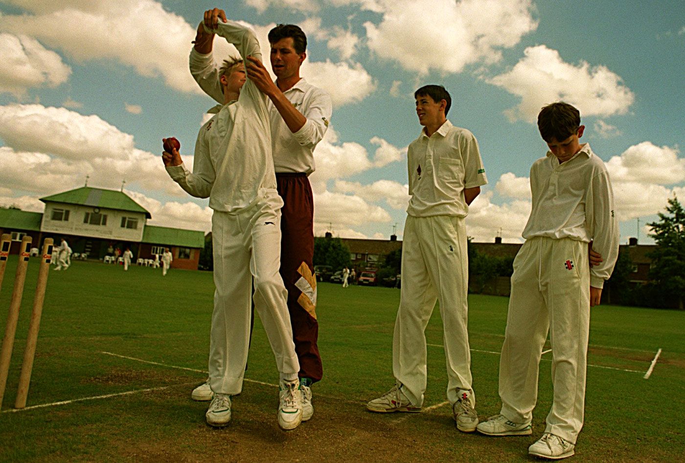 Neil Foster coaches young boys on fast bowling in Northampton