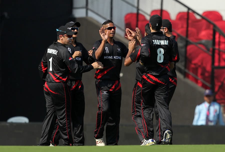 Nadeem Ahmed celebrates with team-mates
