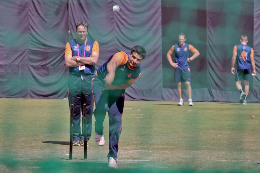 Mudassar Bukhari bowls during a practice session for Netherlands