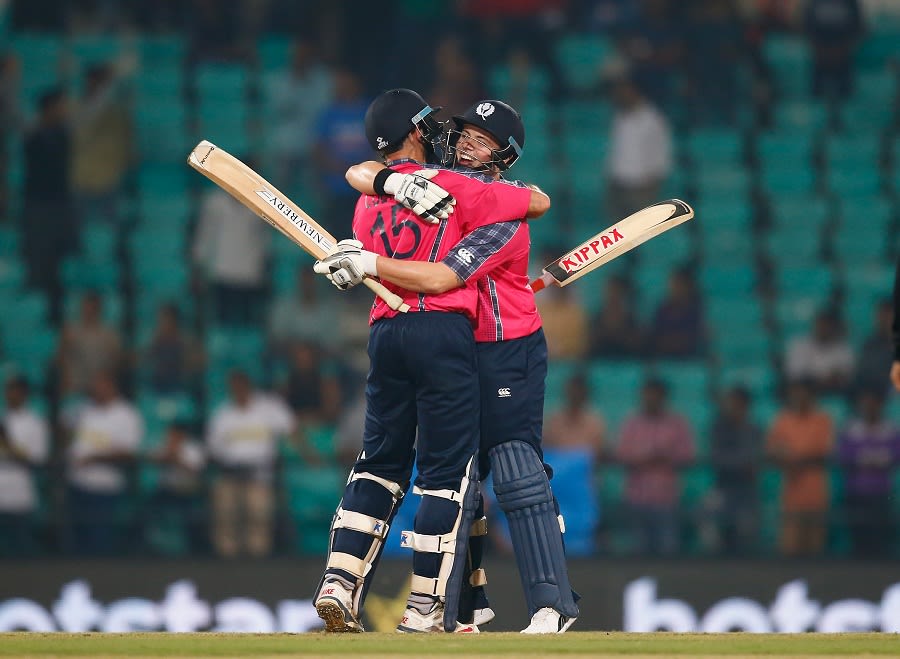 Kyle Coetzer and Matt Machan hug each other after sealing Scotland's win