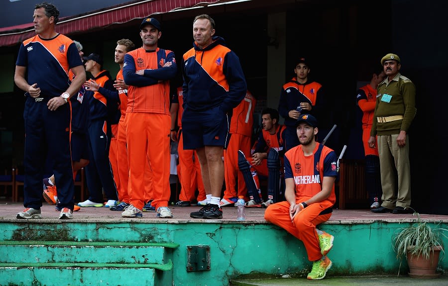 Netherlands' players look on from the dressing room during the rain interruption 