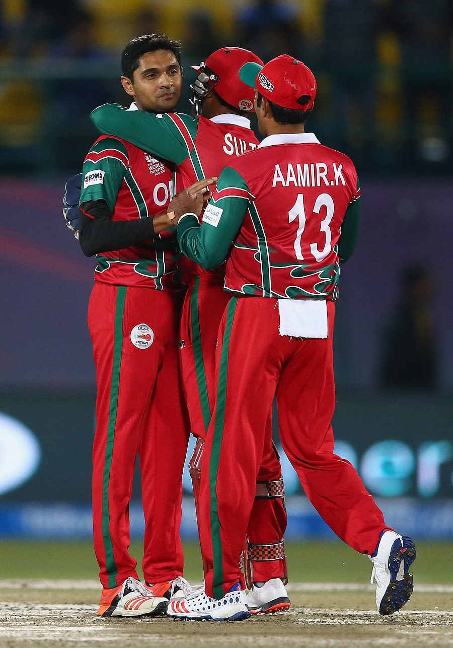 Ajay Lalcheta and team-mates come together at the fall of a wicket