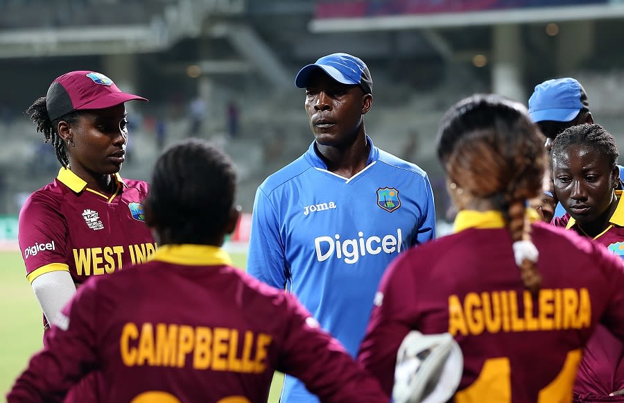 West Indies Women's coach Vasbert Drakes speaks to the players