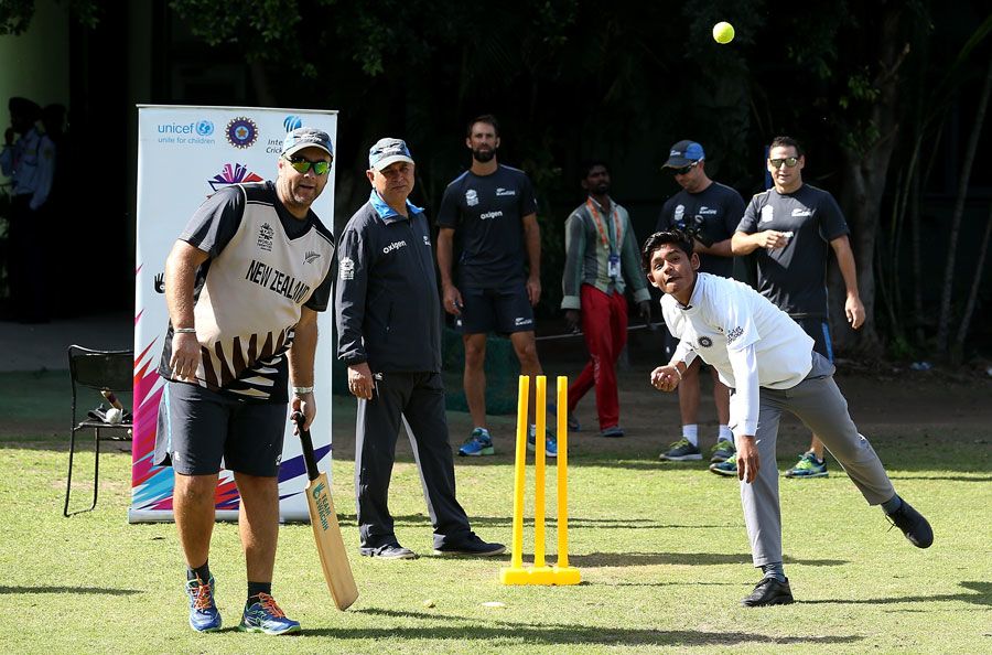 New Zealand players have a game with local children in Mohali