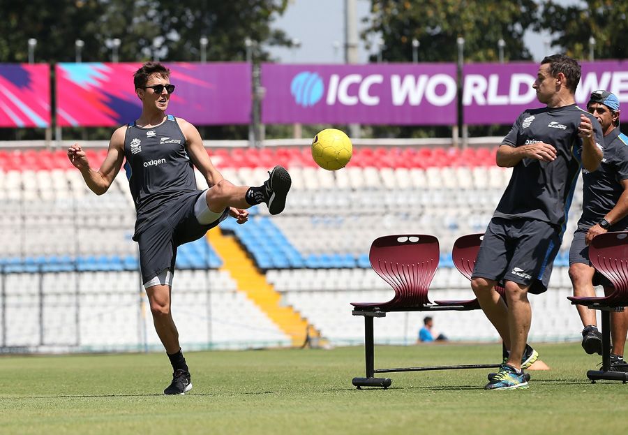 Trent Boult and Nathan McCullum test their football skills