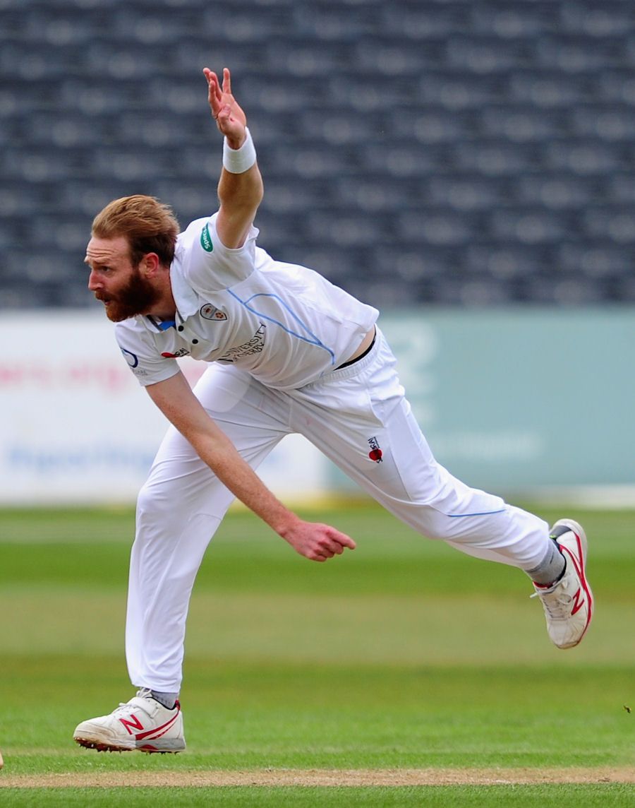Andy Carter bowling for Derbyshire