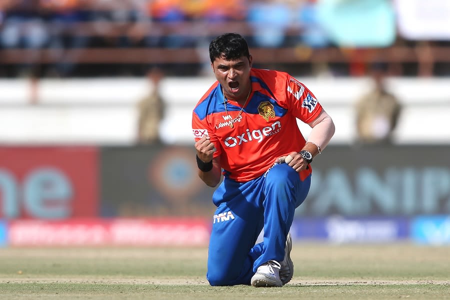 Pravin Tambe is pumped up after taking the big wicket of AB de Villiers