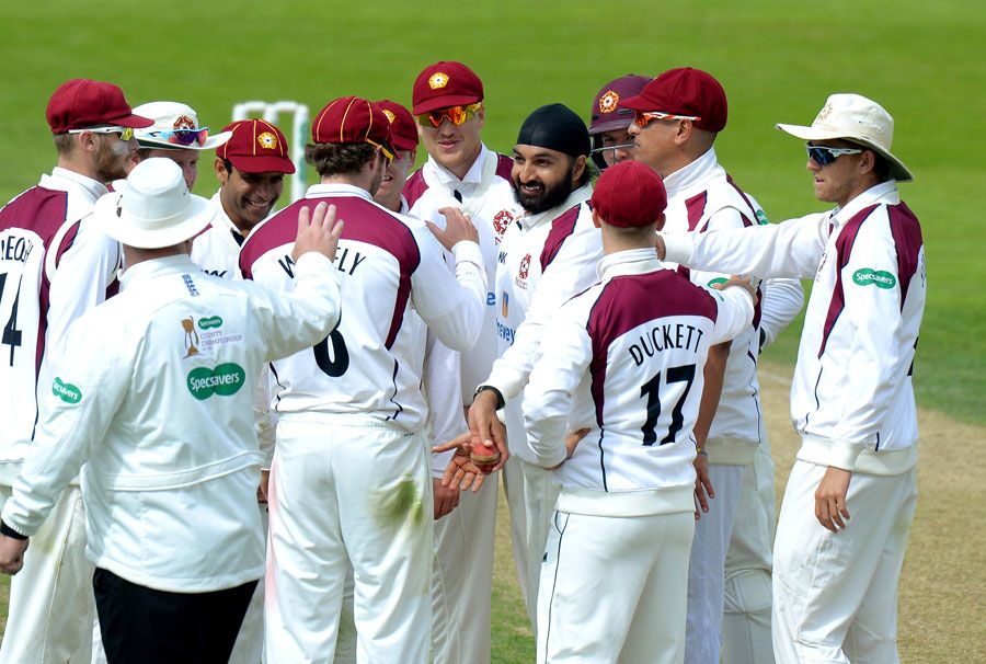 Monty Panesar celebrates his first wicket