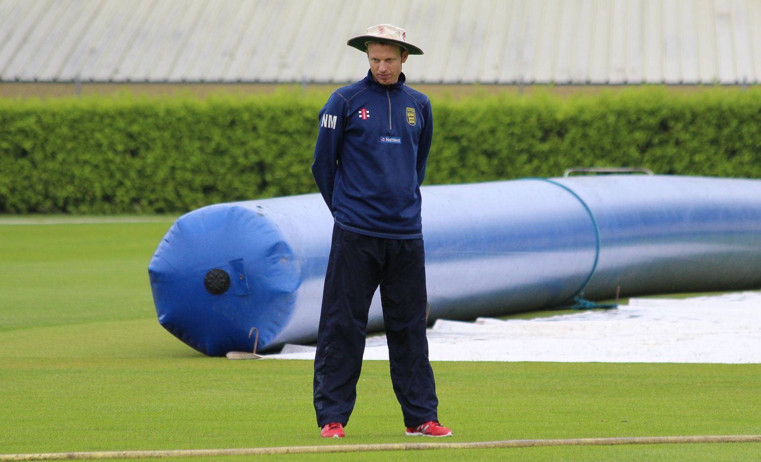 Jersey coach Neil MacRae observes warm-up