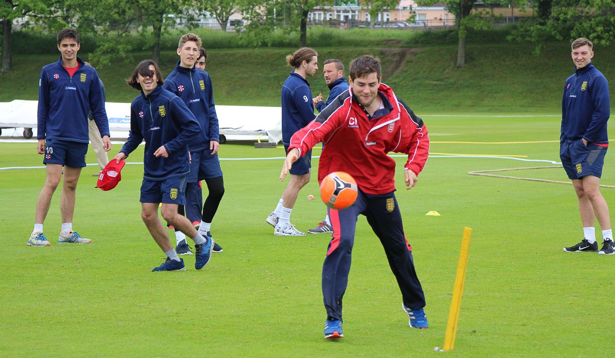 Charles Perchard tries to stop a goal with a handball during warm-ups