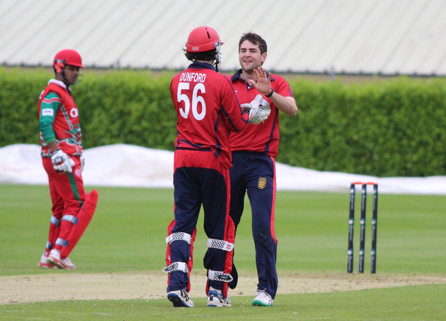 Charles Perchard celebrates one of his three wickets