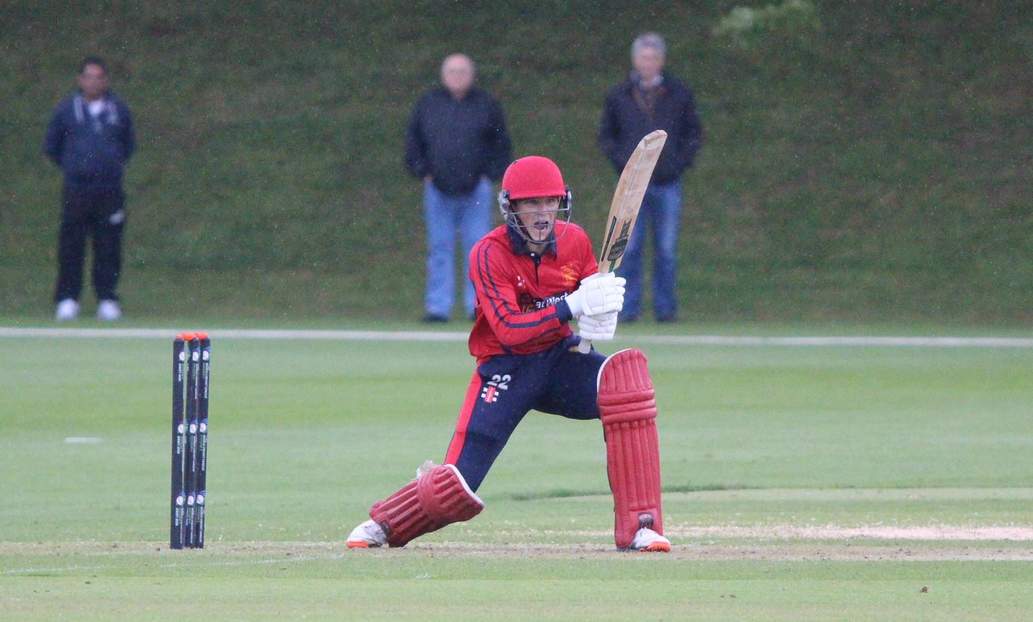 Jonty Jenner bats through the rain