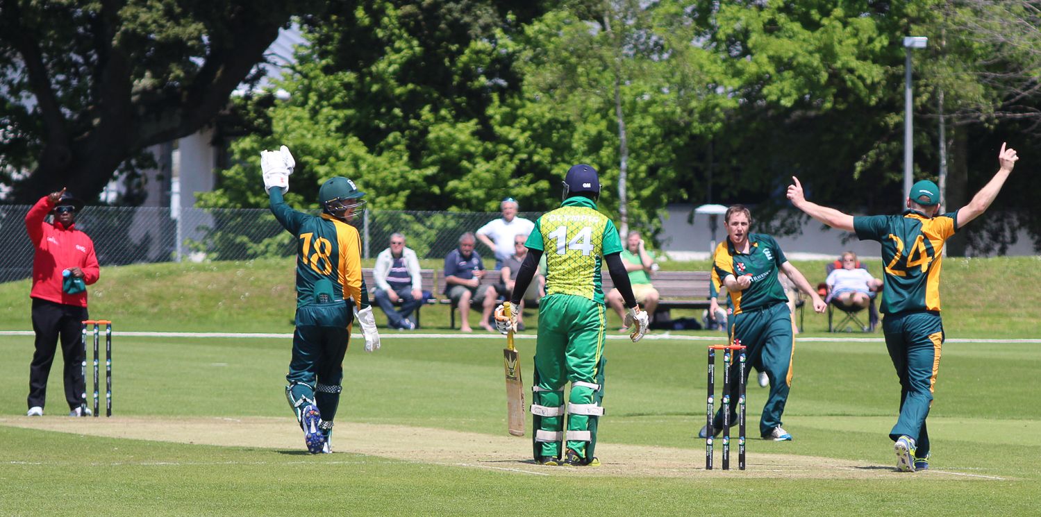 Max Ellis celebrates his third wicket with another catch at slip by Thomas Kirk (24)