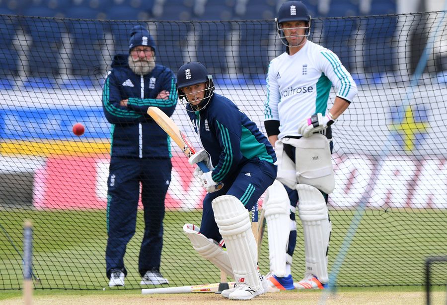 Joe Root bats as Nick Compton and Graeme Fowler look on