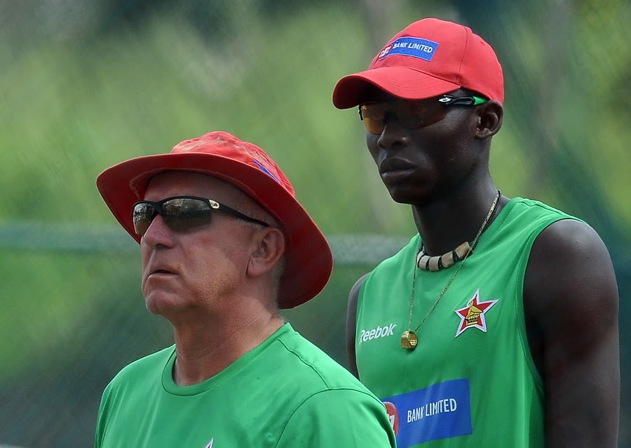 Zimbabwe coach Alan Butcher and pacer Chris Mpofu during Zimbabwe's training session