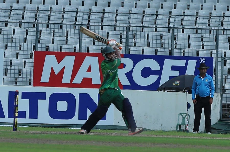 Kalabagan Krira Chakra batsman Hasanuzzaman looks to play one down the ground