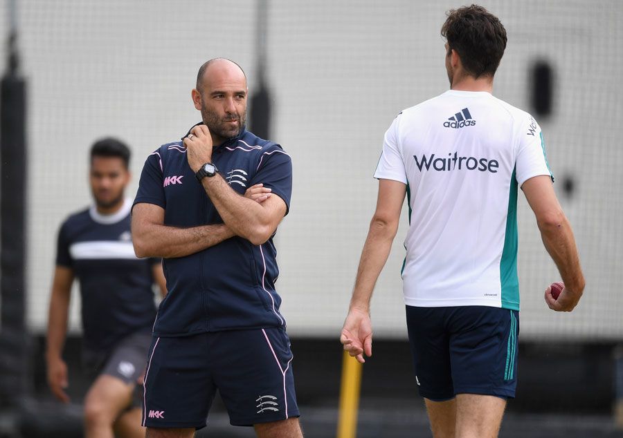 Richard Johnson gives Steven Finn some feedback in the nets