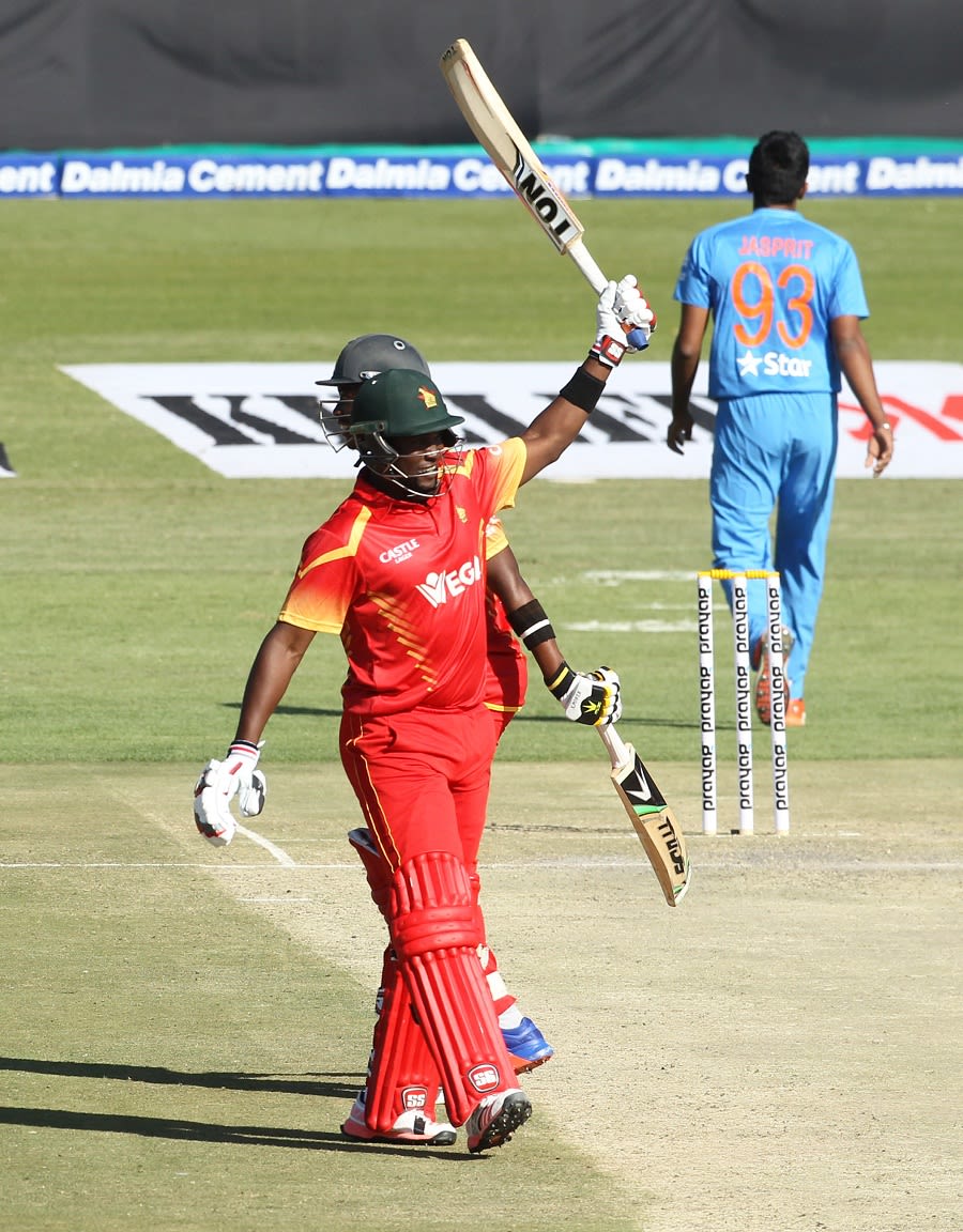 Elton Chigumbura celebrates after reaching his fifty