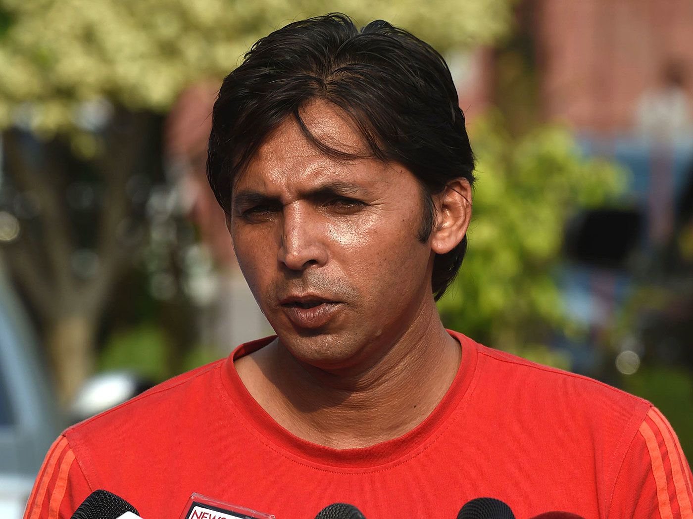 Mohammad Asif speaks at the Gaddafi Stadium