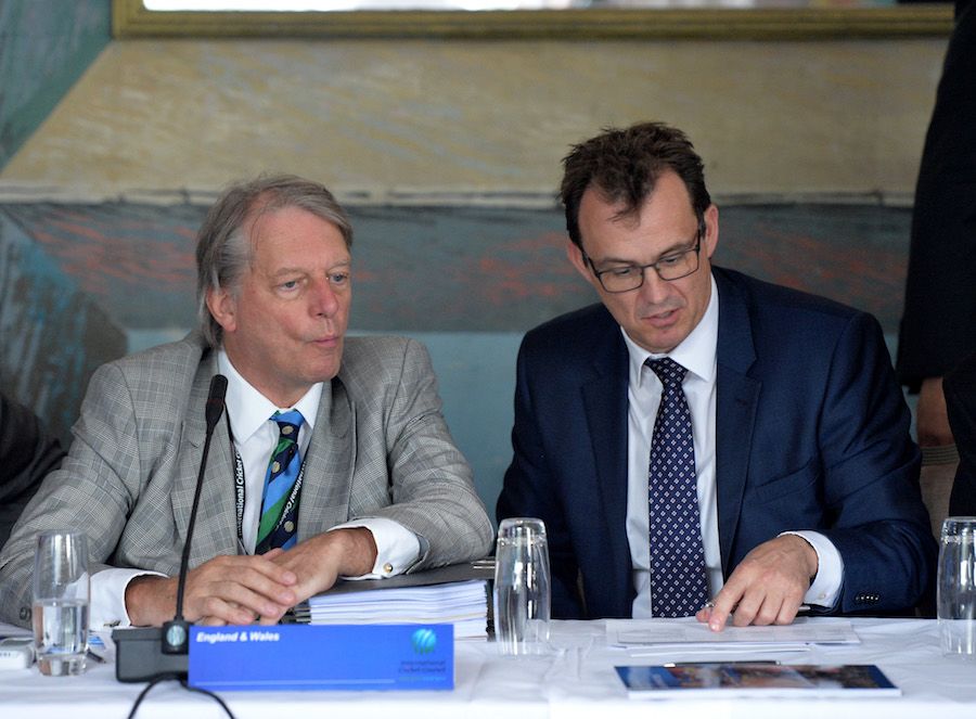 ECB's Giles Clarke looks on in the company of Tom Harrison