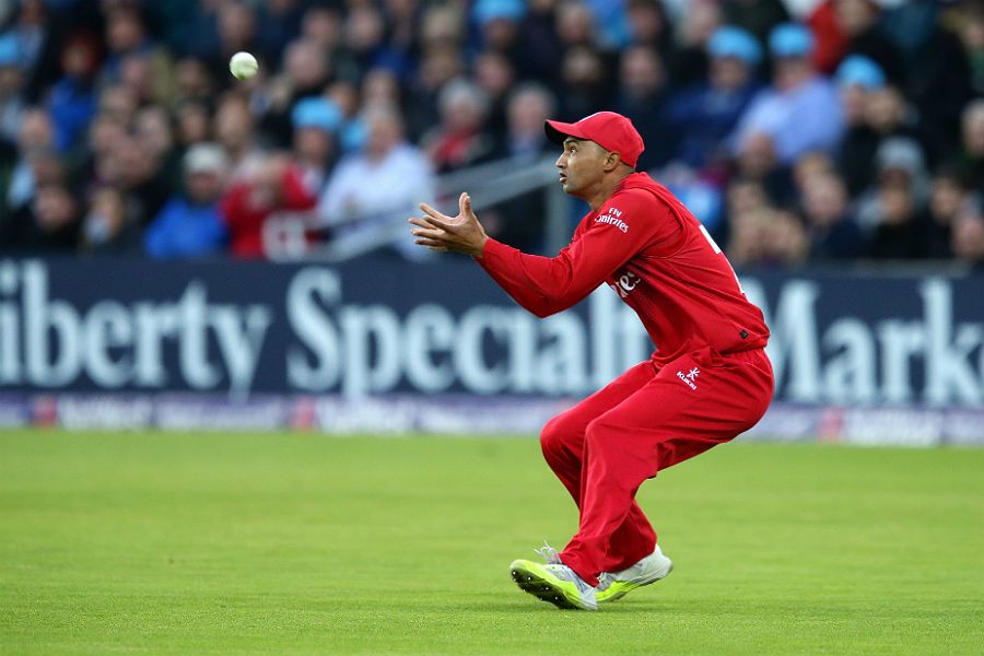 Alviro Petersen steadies himself to take the catch off Gary Ballance