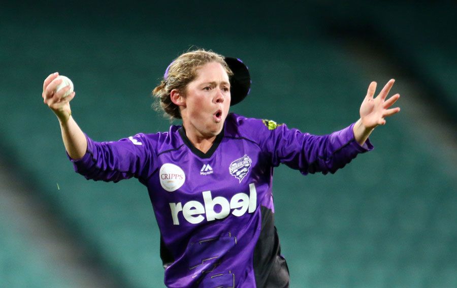 Corinne Hall celebrates taking a catch