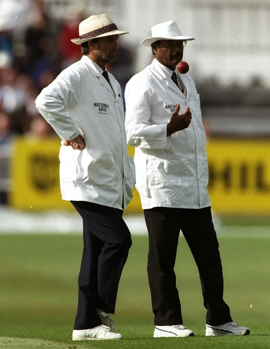 Umpires Peter Willey and Javed Akhtar watch proceedings