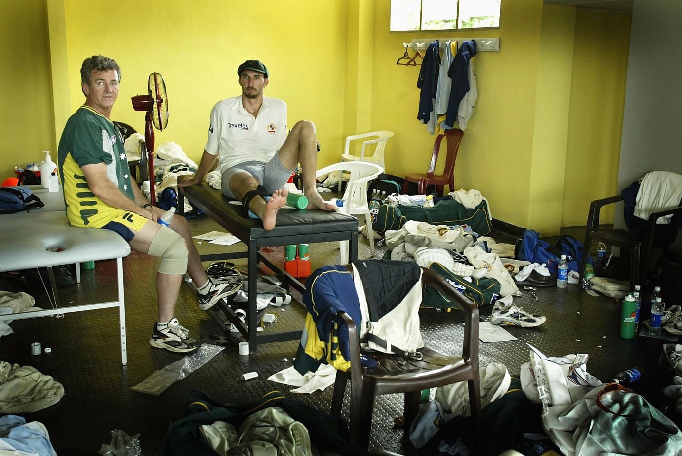 Jason Gillespie and Errol Alcott in the dressing room after Australia's victory